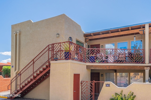 6255 N Camino Pimeria Alta Unit 22, Tucson, AZ 85718 - view of building exterior featuring stairway