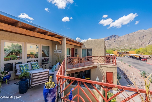 6255 N Camino Pimeria Alta Unit 22, Tucson, AZ 85718 - view of patio / terrace featuring a balcony, a mountain view, and outdoor lounge area