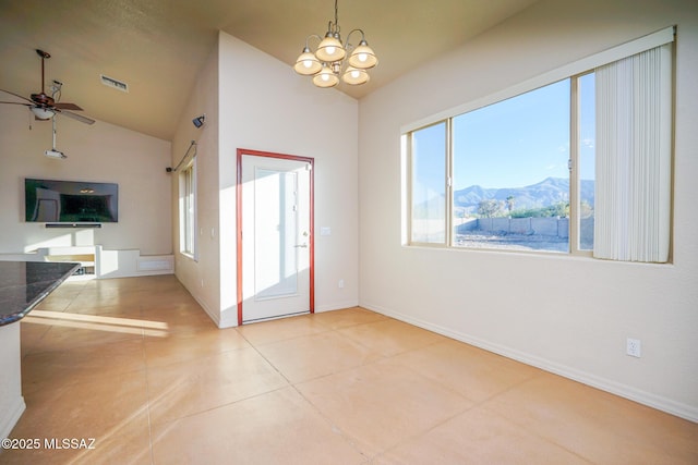 4210 S Santolina Ct, Sierra Vista, AZ 85650 - unfurnished dining area featuring lofted ceiling, a mountain view, light tile patterned floors, a ceiling fan, and a chandelier