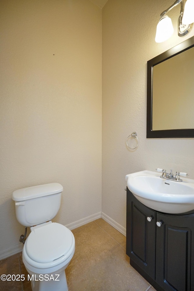 4210 S Santolina Ct, Sierra Vista, AZ 85650 - half bath with vanity, toilet, and baseboards