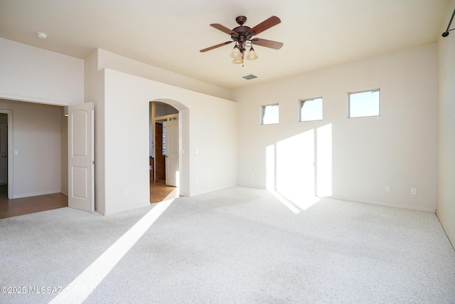 4210 S Santolina Ct, Sierra Vista, AZ 85650 - carpeted spare room with arched walkways, ceiling fan, a smoke detector, and baseboards