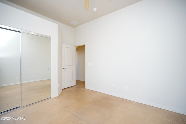 4210 S Santolina Ct, Sierra Vista, AZ 85650 - unfurnished bedroom featuring a closet, light tile patterned floors, and baseboards