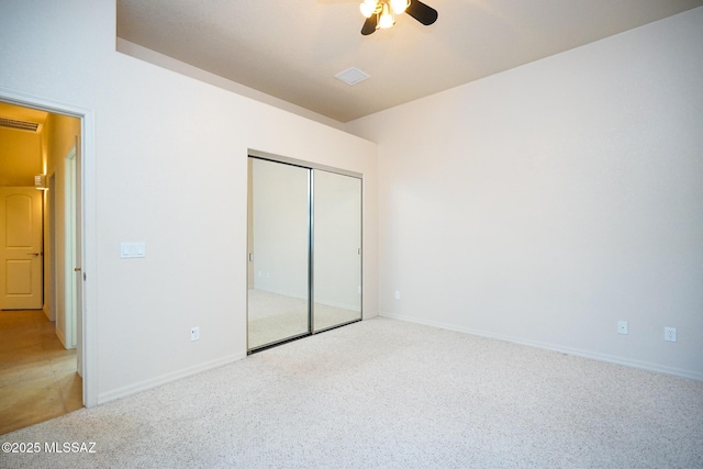 4210 S Santolina Ct, Sierra Vista, AZ 85650 - unfurnished bedroom featuring carpet flooring, a closet, baseboards, and ceiling fan