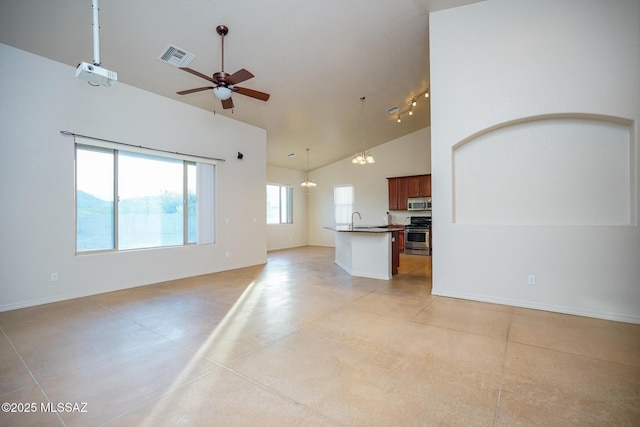 4210 S Santolina Ct, Sierra Vista, AZ 85650 - unfurnished living room featuring a sink, a ceiling fan, high vaulted ceiling, baseboards, and a chandelier