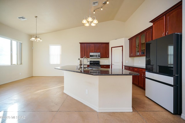 4210 S Santolina Ct, Sierra Vista, AZ 85650 - kitchen featuring smart refrigerator, stainless steel microwave, a chandelier, dark countertops, and lofted ceiling