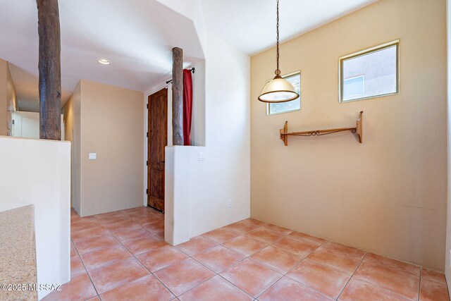11315 N Mountain Meadow Pl, Oro Valley, AZ 85737 - corridor with light tile patterned flooring and lofted ceiling