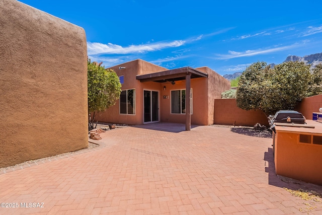 11315 N Mountain Meadow Pl, Oro Valley, AZ 85737 - view of patio featuring ceiling fan and a mountain view