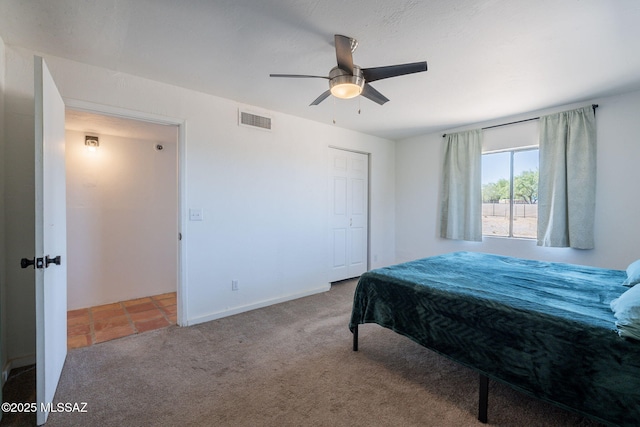 9845 N Volk Ave, Marana, AZ 85653 - bedroom with carpet flooring, ceiling fan, and baseboards