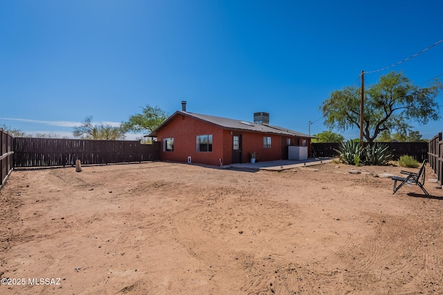 9845 N Volk Ave, Marana, AZ 85653 - back of house with a fenced backyard and a patio