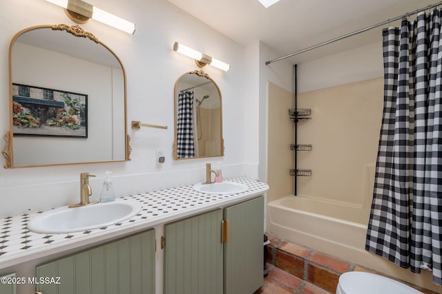 9845 N Volk Ave, Marana, AZ 85653 - bathroom featuring double vanity, shower / bathtub combination with curtain, and toilet