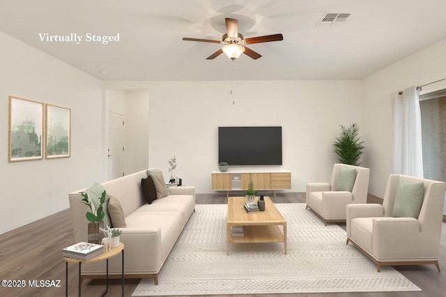 8880 W Blakebrook Rd, Marana, AZ 85653 - living room featuring wood finished floors and a ceiling fan