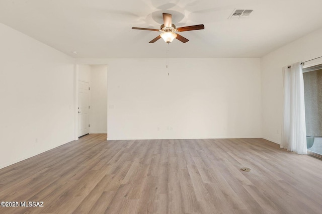 8880 W Blakebrook Rd, Marana, AZ 85653 - empty room featuring ceiling fan and light wood finished floors