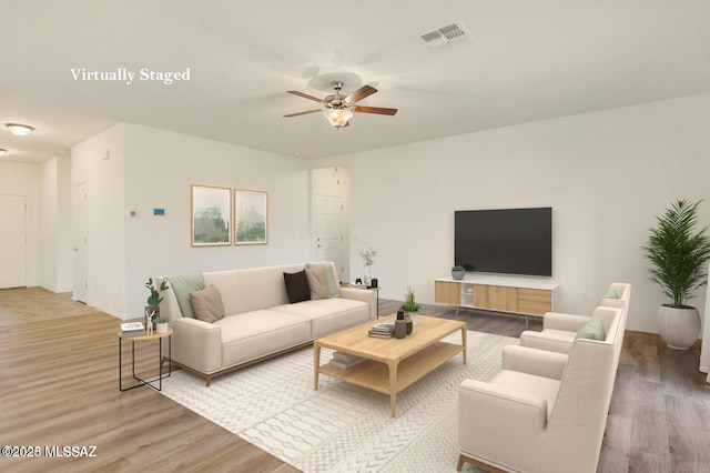 8880 W Blakebrook Rd, Marana, AZ 85653 - living area with wood finished floors and a ceiling fan