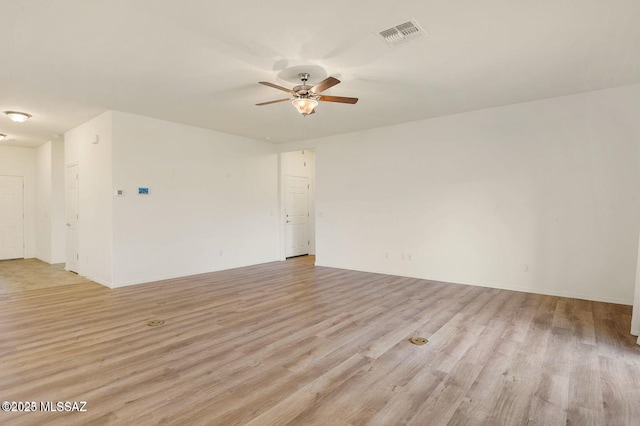8880 W Blakebrook Rd, Marana, AZ 85653 - spare room with a ceiling fan and light wood-type flooring