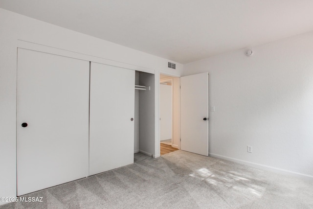 828 S Langley Ave Unit 101, Tucson, AZ 85710 - unfurnished bedroom featuring carpet flooring and a closet