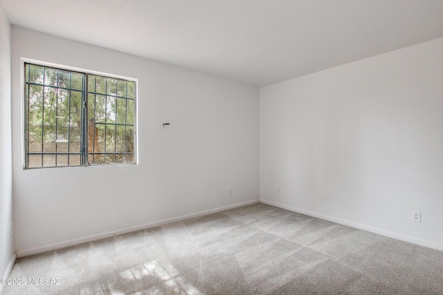 828 S Langley Ave Unit 101, Tucson, AZ 85710 - carpeted empty room with baseboards