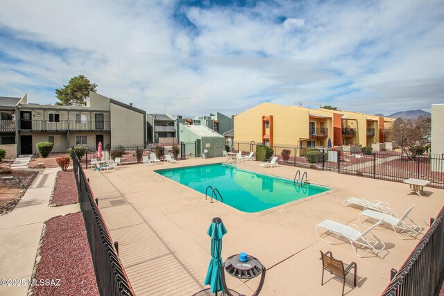 828 S Langley Ave Unit 101, Tucson, AZ 85710 - community pool featuring a residential view and a patio