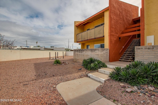 828 S Langley Ave Unit 101, Tucson, AZ 85710 - fenced backyard featuring stairs