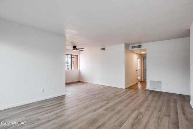 828 S Langley Ave Unit 101, Tucson, AZ 85710 - empty room featuring a ceiling fan, wood finished floors, and baseboards