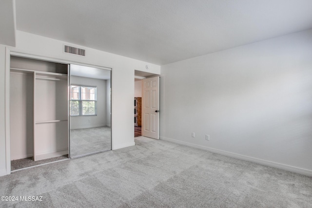 5357 N Paseo De La Terraza, Tucson, AZ 85750 - unfurnished bedroom with carpet, a closet, and baseboards