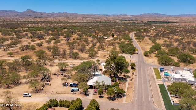 517 Kino Springs Dr, Nogales, AZ 85621 - aerial view of property's location with a mountain backdrop and a desert landscape