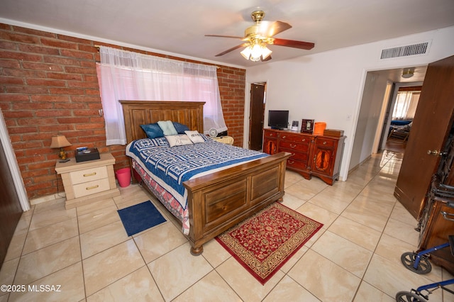 517 Kino Springs Dr, Nogales, AZ 85621 - bedroom featuring brick wall, light tile patterned floors, and a ceiling fan