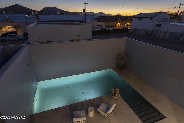 388 S Convent Ave, Tucson, AZ 85701 - patio terrace at dusk with a balcony and a mountain view