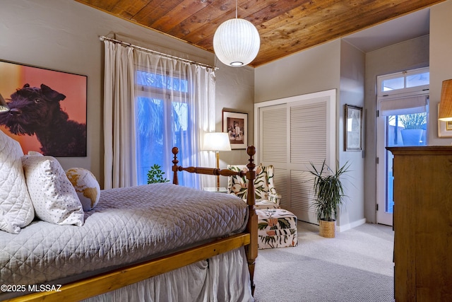 388 S Convent Ave, Tucson, AZ 85701 - bedroom with carpet floors, a closet, and wooden ceiling