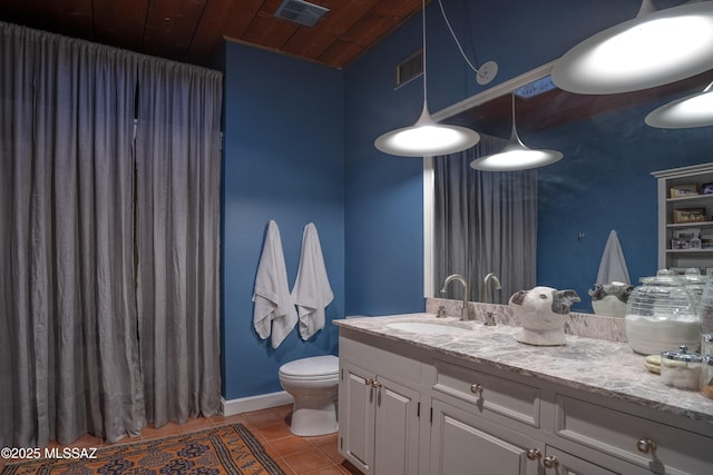 388 S Convent Ave, Tucson, AZ 85701 - bathroom featuring wood ceiling, toilet, vanity, tile patterned flooring, and baseboards