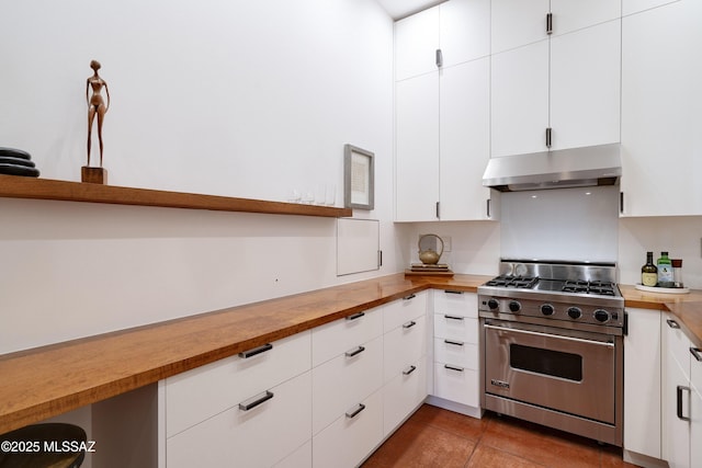 388 S Convent Ave, Tucson, AZ 85701 - kitchen featuring designer range, under cabinet range hood, butcher block counters, open shelves, and white cabinetry