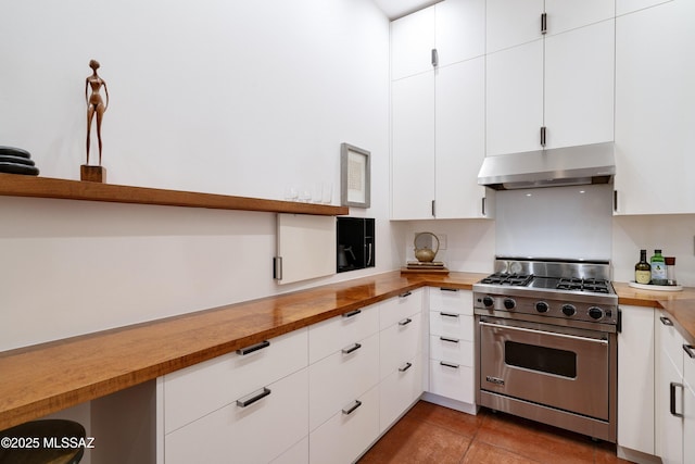 388 S Convent Ave, Tucson, AZ 85701 - kitchen with designer range, under cabinet range hood, wood counters, white cabinets, and open shelves