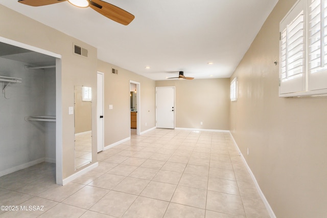 5826 E Hawthorne St, Tucson, AZ 85711 - spare room featuring a ceiling fan, light tile patterned floors, recessed lighting, and baseboards