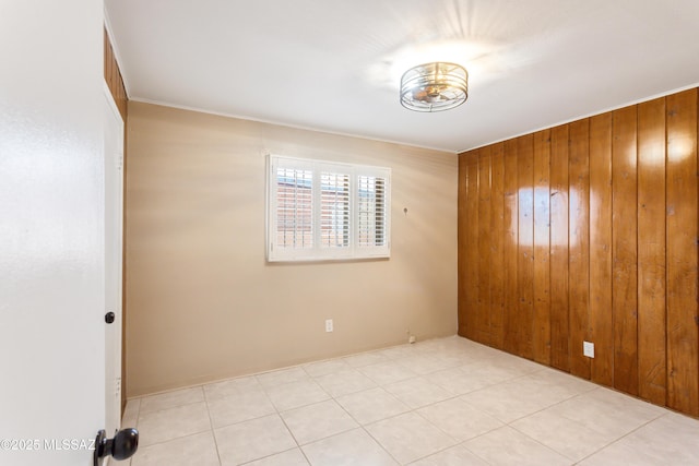 5826 E Hawthorne St, Tucson, AZ 85711 - spare room with wooden walls