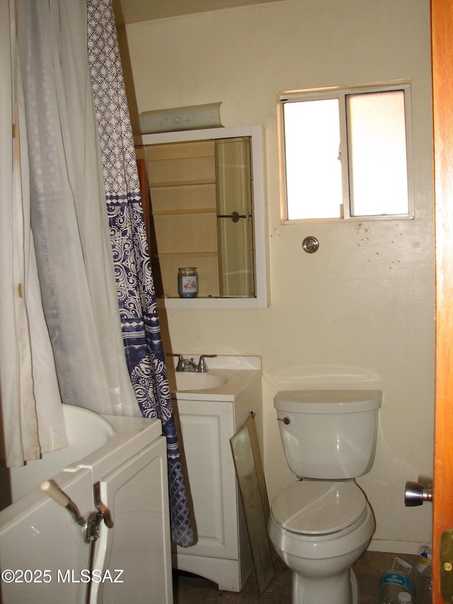 487 E Patrick Dr, Benson, AZ 85602 - bathroom featuring vanity, toilet, and shower / bath combination with curtain