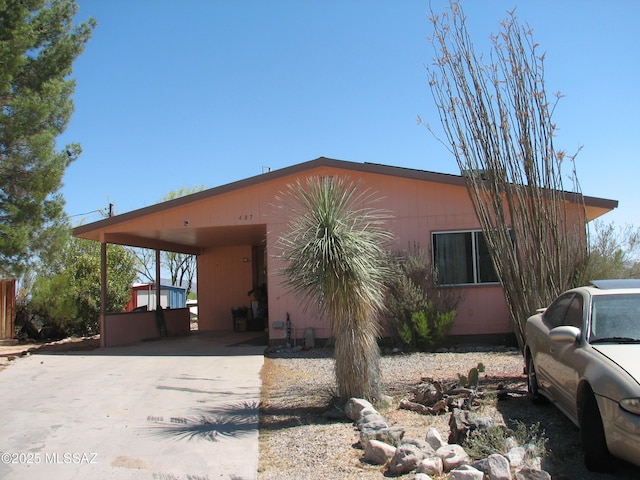 487 E Patrick Dr, Benson, AZ 85602 - view of side of property with driveway and an attached carport