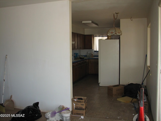 487 E Patrick Dr, Benson, AZ 85602 - kitchen featuring freestanding refrigerator