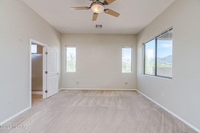 12970 N Topanga Dr, Tucson, AZ 85755 - carpeted spare room with ceiling fan and baseboards