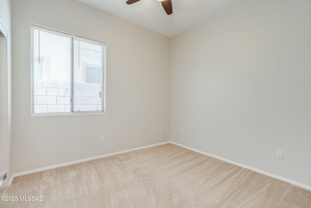 12970 N Topanga Dr, Tucson, AZ 85755 - spare room with a ceiling fan, plenty of natural light, carpet flooring, and baseboards