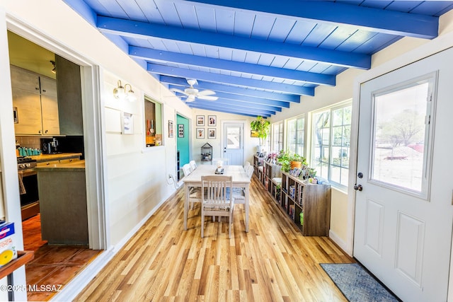 453 W Union St, Benson, AZ 85602 - sunroom / solarium with wood finished floors, wooden ceiling with exposed beams, and baseboards