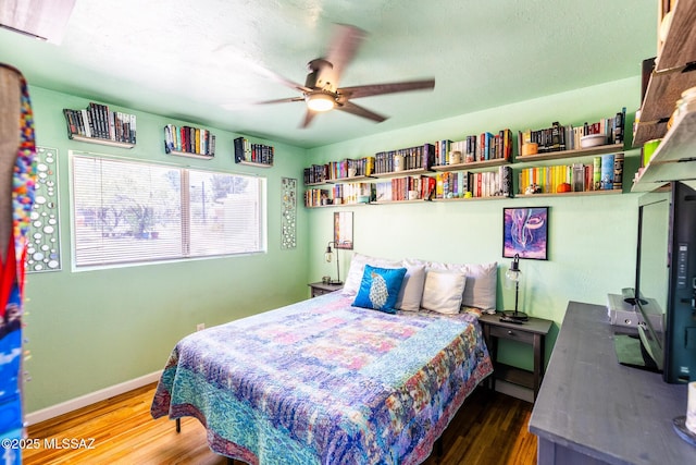 453 W Union St, Benson, AZ 85602 - bedroom featuring wood finished floors, baseboards, and a ceiling fan