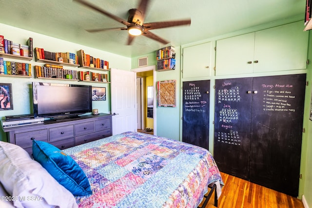 453 W Union St, Benson, AZ 85602 - bedroom featuring wood finished floors and a ceiling fan