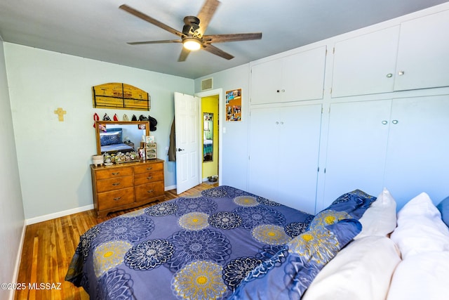 453 W Union St, Benson, AZ 85602 - bedroom featuring wood finished floors, baseboards, and a ceiling fan