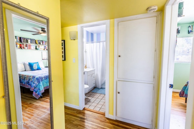 453 W Union St, Benson, AZ 85602 - corridor featuring wood finished floors and baseboards