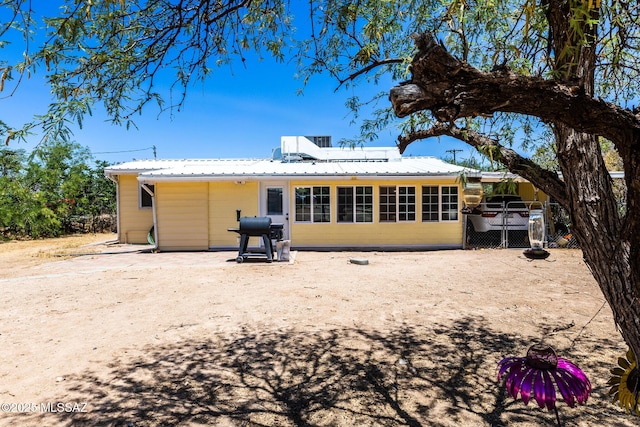 453 W Union St, Benson, AZ 85602 - back of house featuring metal roof
