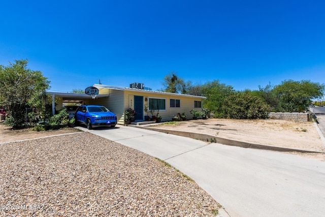 453 W Union St, Benson, AZ 85602 - ranch-style house featuring concrete driveway and an attached carport