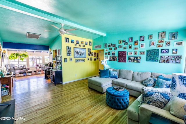 453 W Union St, Benson, AZ 85602 - living room with wood finished floors, a ceiling fan, and baseboards