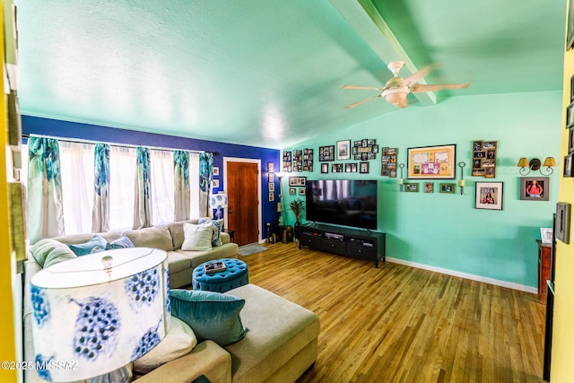 453 W Union St, Benson, AZ 85602 - living area featuring ceiling fan, wood finished floors, vaulted ceiling, and baseboards