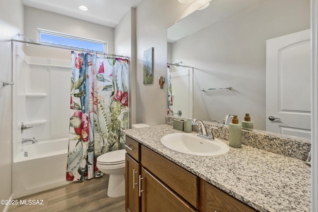 62146 E Marble Dr, Oracle, AZ 85623 - full bathroom featuring toilet, vanity, wood finished floors, shower / bath combo with shower curtain, and recessed lighting