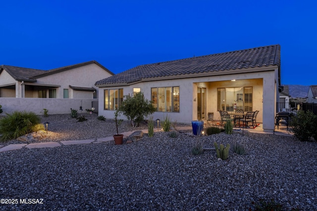 62146 E Marble Dr, Oracle, AZ 85623 - rear view of property featuring stucco siding, a tile roof, and a patio