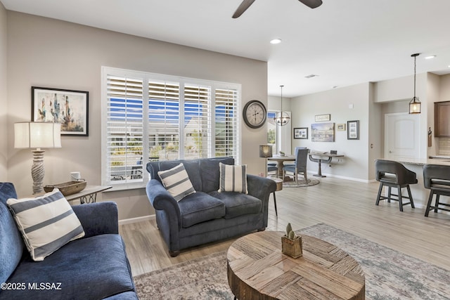 62146 E Marble Dr, Oracle, AZ 85623 - living area featuring light wood-style flooring, ceiling fan, recessed lighting, and baseboards
